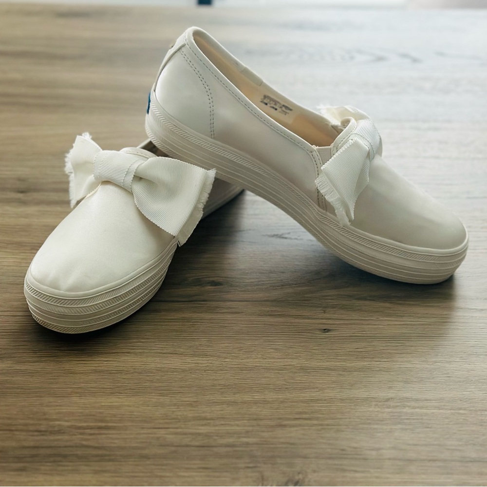 Kate Spade White Bow Slip-On SneakersKate Spade triple decker slip on sneakers